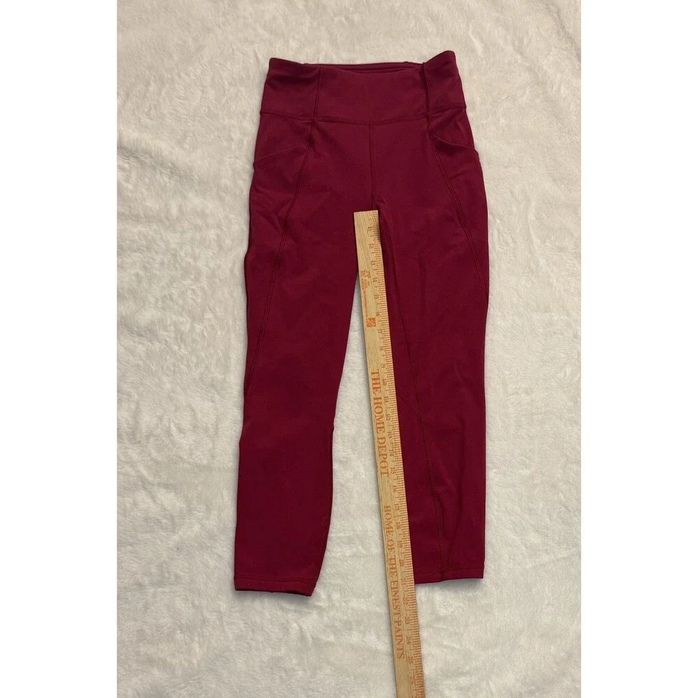 Lululemon Time To Sweat Crops Ruby Red Reflective Cuffs Logo Pockets Size 4